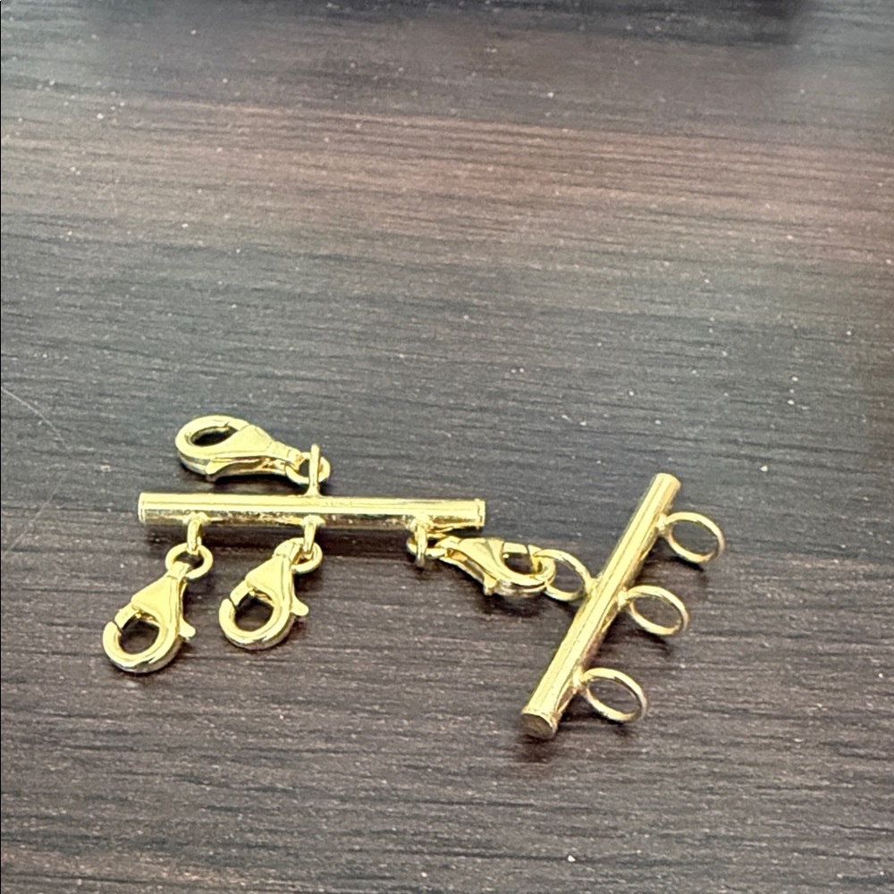 Layered clasp